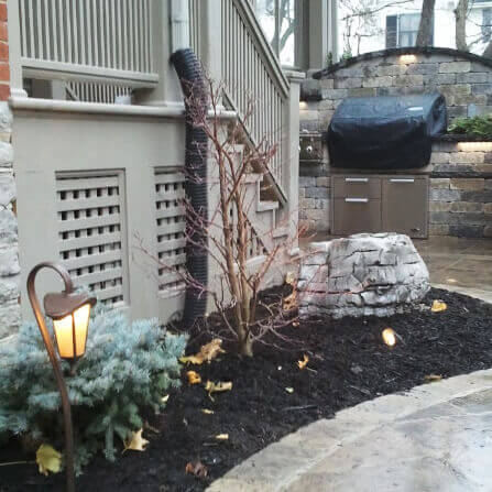 Patio grounds with landscape lighting